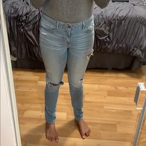 Hollister blue jeans with tears